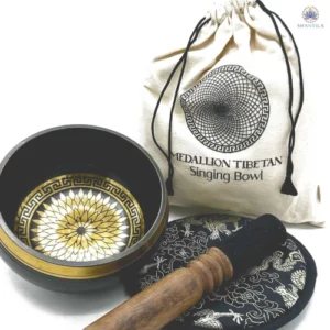 Bol chantant tibétain artisanal 14cm gravé de médaillons ronds mandalas avec maillet