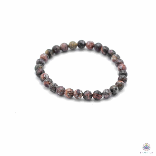 Bracelet Perles Jaspe Peau de Léopard — Courage 1 Bracelet jaspe peau de léopard : perles gris-brun tachetées de rose et de noir, posé à plat sur fond blanc